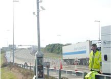 Terminal complex on British side of Channel Tunnel*Mouth of Chunnel*Loading and unloading facilities*Installing instruments on British side*Installing instruments on British side*Road-temperature sensor on British side*Instruments on French side*Instruments on French side*Instruments on French side*Instruments on French side